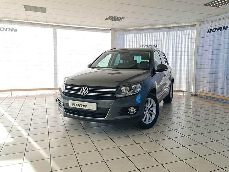 Grau Gebraucht 2016 VW Tiguan LOUNGE SUV | 16.990 € (Guter Preis) - Bild 1/4
