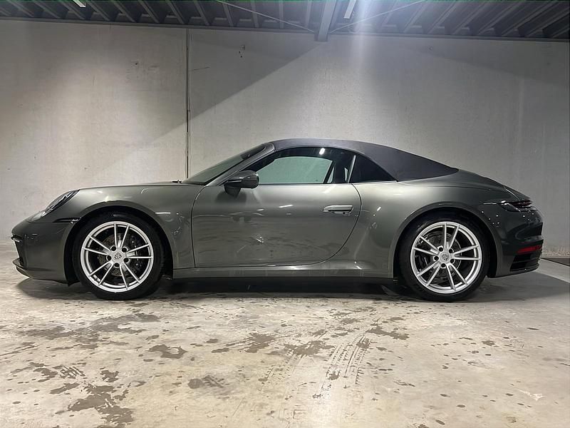 Gebraucht Porsche 911 Carrera 385 PS (283 kW) 2024 Aventuringrünmetallic Cabrio