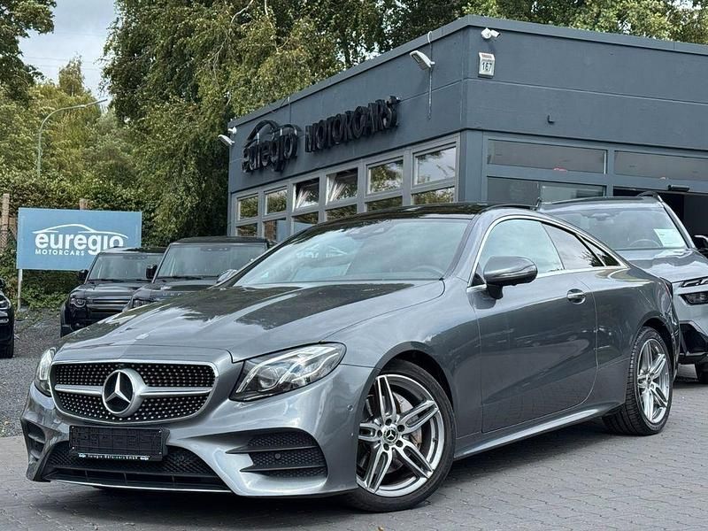 Grau Gebraucht 2018 Mercedes E220 AMG line Coupé | 28.990 € (Superpreis) - Bild 1/4