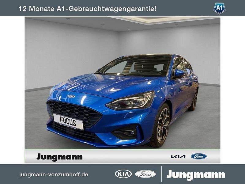 Desert island blue Gebraucht 2019 Ford Focus Titanium Limousine | 14.250 € (Guter Preis) - Bild 1/4