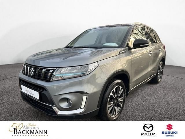 Grau Gebraucht 2021 Suzuki Vitara Comfort+ SUV | 19.950 € (Fairer Preis) - Bild 1/3