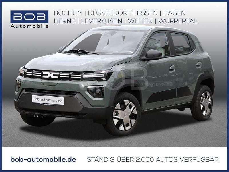Safaribeige (beige) Neu 2024 Dacia Spring Expression Kleinwagen | 16.844 € (Fairer Preis) - Bild 1/3