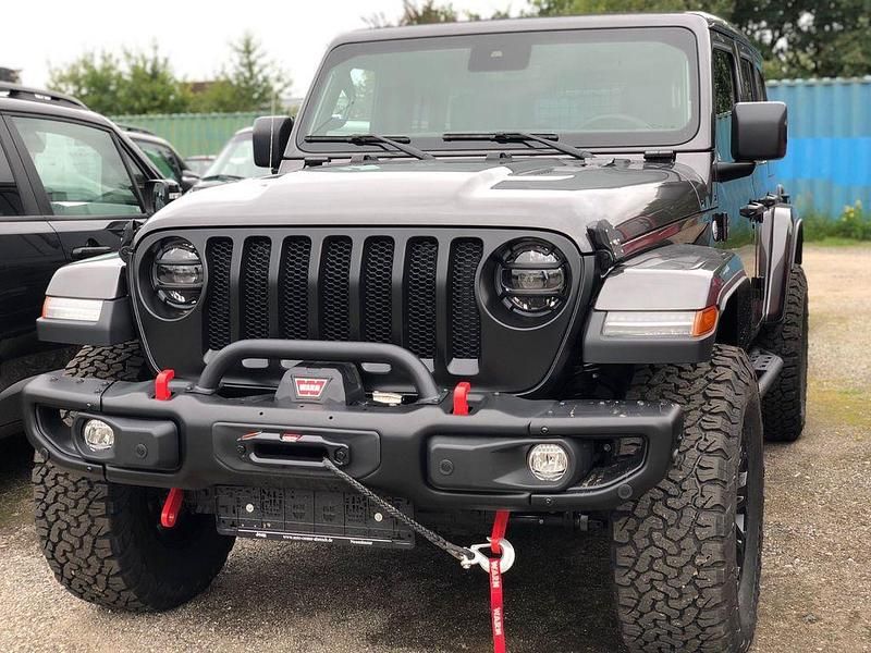 Grau Gebraucht 2021 Jeep Wrangler Sahara SUV | 59.900 € - Bild 1/4