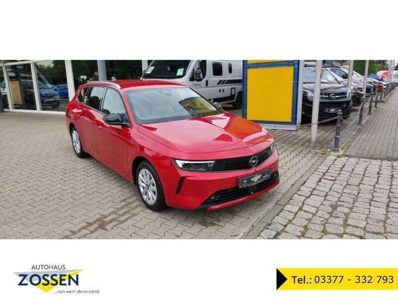 Farbig lackiert (rot Gebraucht 2023 Opel Astra Elegance Kombi | 22.450 € (Fairer Preis) - Bild 1/4