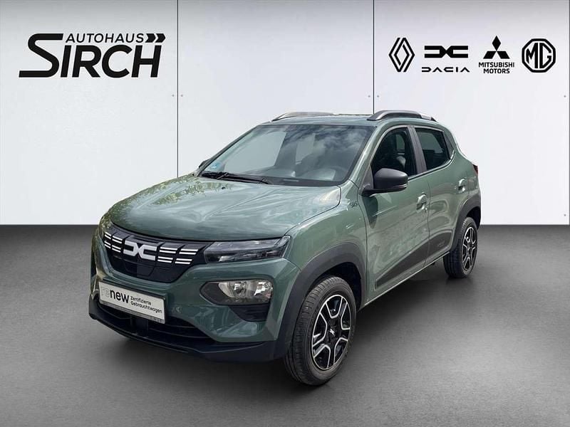Olivgrau Gebraucht 2023 Dacia Spring Essentiel Kleinwagen | 9.990 € (Superpreis) - Bild 1/4