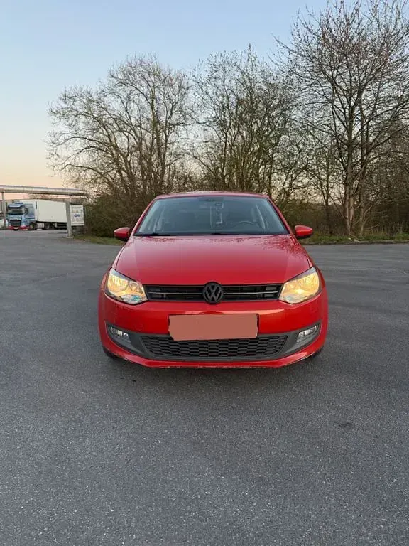 Gebraucht VW Polo Team 105 PS (77 kW) 2010 Orange Kleinwagen