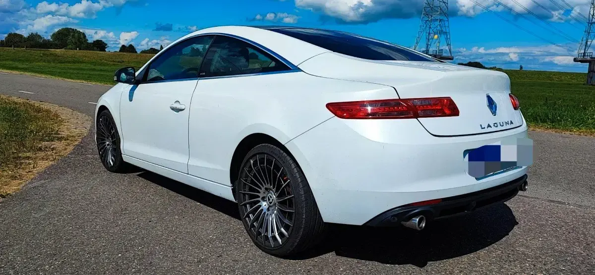 Używany Renault Laguna Coupé 173 KM (127 kW) 2012 Biały Coupe