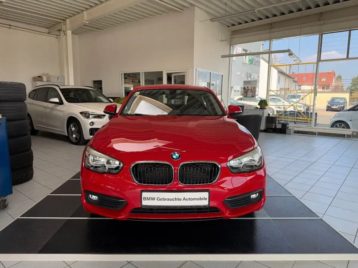 Używany BMW 116 Advantage 109 KM (80 kW) 2015 Czerwony Hatchback