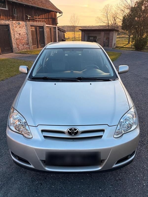 Usado Toyota Corolla 97 HP (71 kW) 2006 Prateado Sedan