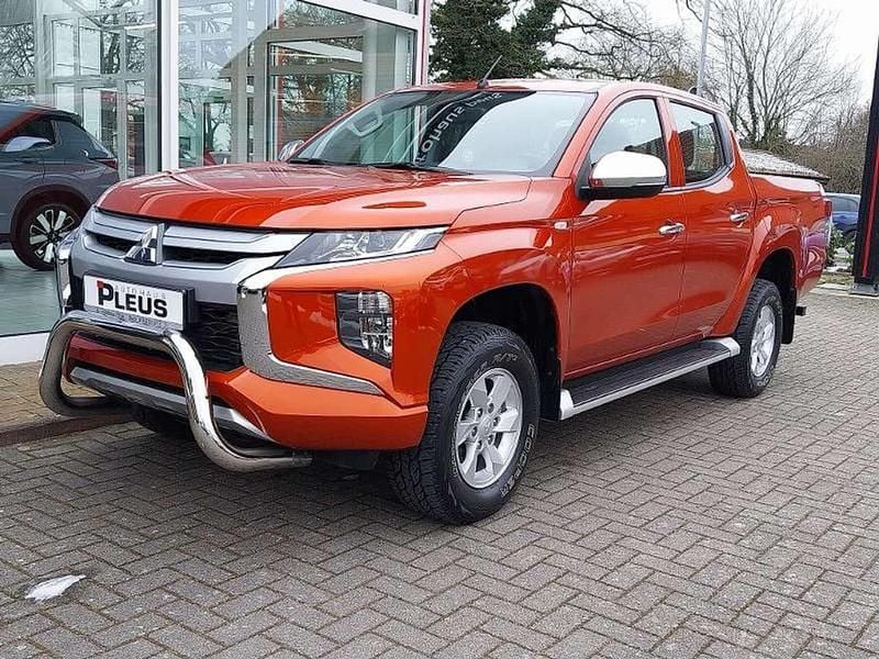 Gebraucht Mitsubishi L200 Basis 150 PS (110 kW) 2021 Zirkonorange Abholung