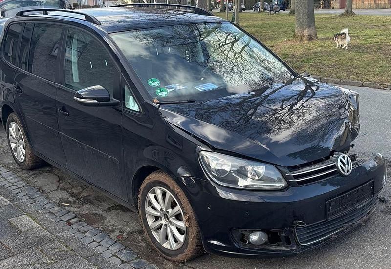 Gebraucht VW Touran Comfortline 105 PS (77 kW) 2012 Schwarz Van / Kleinbus