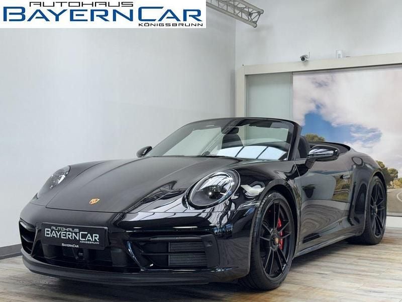 Tiefschwarz metallic Gebraucht 2024 Porsche 992 Cabrio | 169.789 € (Fairer Preis) - Bild 1/4