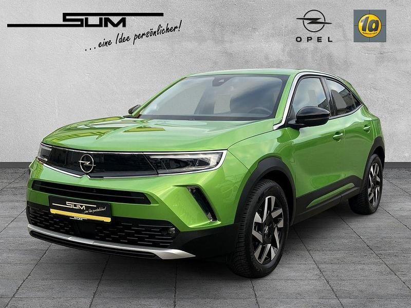 Matcha green/ikone gruen Gebraucht 2022 Opel Mokka-e Elegance SUV | 18.490 € (Fairer Preis) - Bild 1/4