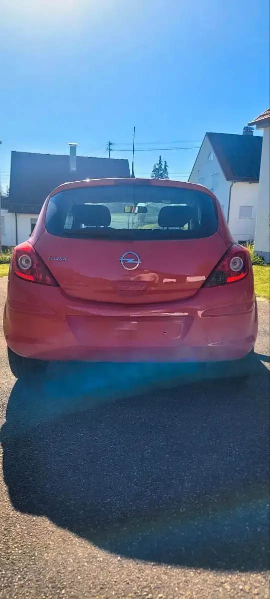 Gebraucht Opel Corsa Edition 69 PS (50 kW) 2014 Rot Kleinwagen