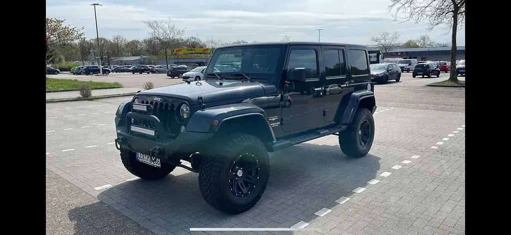 Gebraucht Jeep Wrangler Unlimited Sahara 200 PS (147 kW) 2014 Schwarz SUV