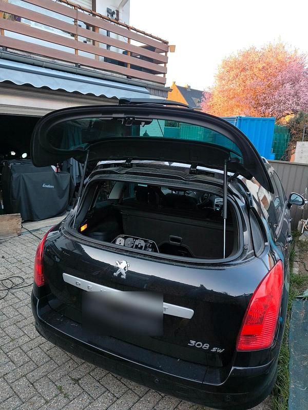 Gebraucht Peugeot 308 SW 109 PS (80 kW) 2010 Schwarz Kombi