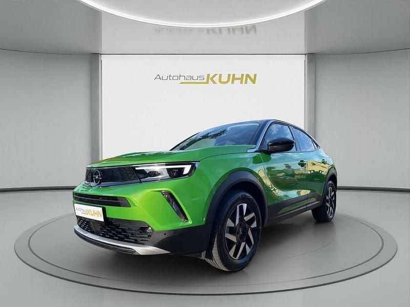 Matcha green/ikone gruen Gebraucht 2022 Opel Mokka Elegance SUV | 22.490 € (Fairer Preis) - Bild 1/4