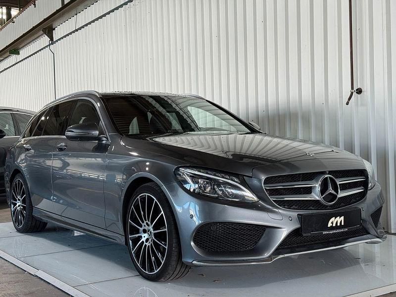 Grau Gebraucht 2018 Mercedes C400 AMG line Limousine | 21.990 € (Fairer Preis) - Bild 1/4