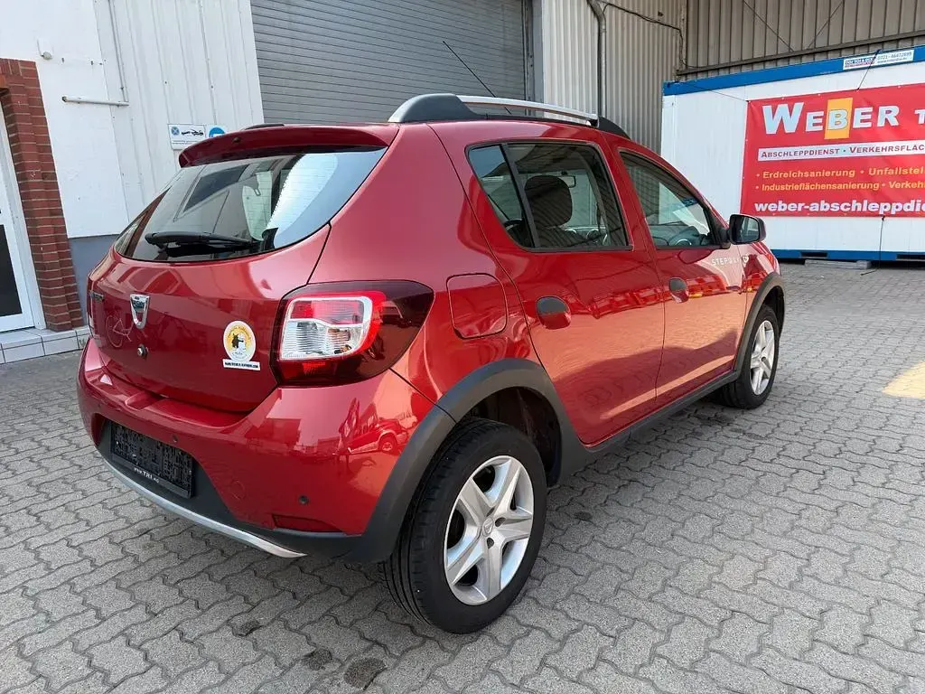 Gebraucht Dacia Sandero Prestige 90 PS (66 kW) 2015 Orange Limousine