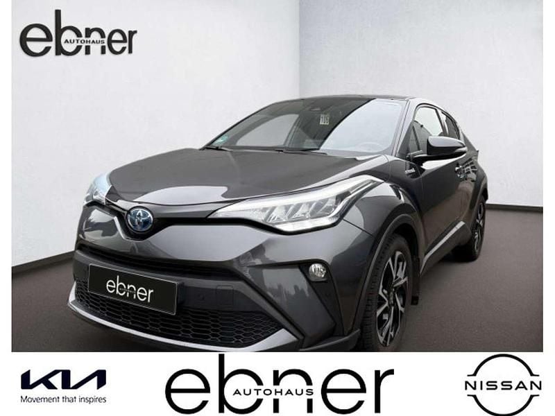 Grey metallic Gebraucht 2021 Toyota C-HR+ Team SUV | 22.190 € (Guter Preis) - Bild 1/4
