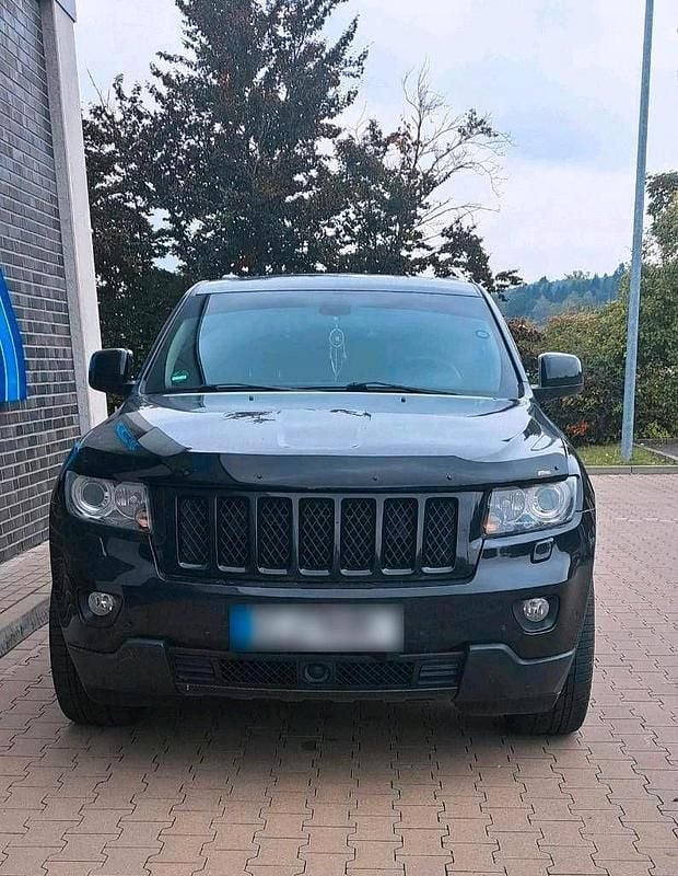 Gebraucht Jeep Grand Cherokee Overland 250 PS (183 kW) 2013 Schwarz SUV