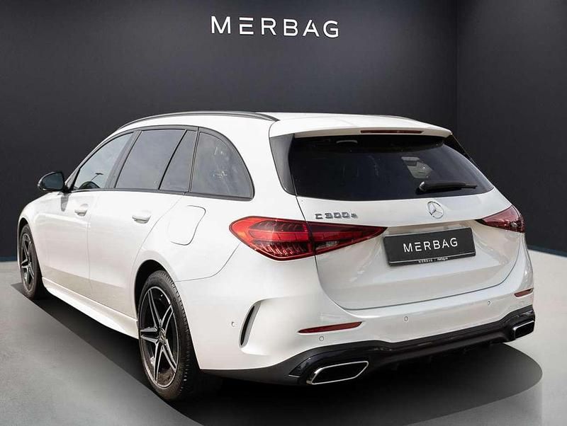 Gebraucht Mercedes C300e Business 313 PS (230 kW) 2023 Unilack polarweiß Kombi