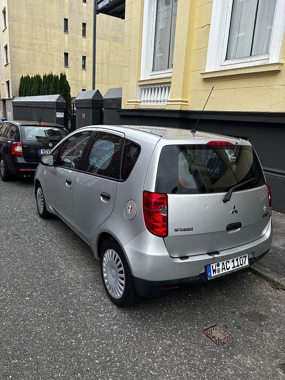 Grau Gebraucht 2009 Mitsubishi Colt Van / Kleinbus | 2.400 € (Guter Preis) - Bild 1/4
