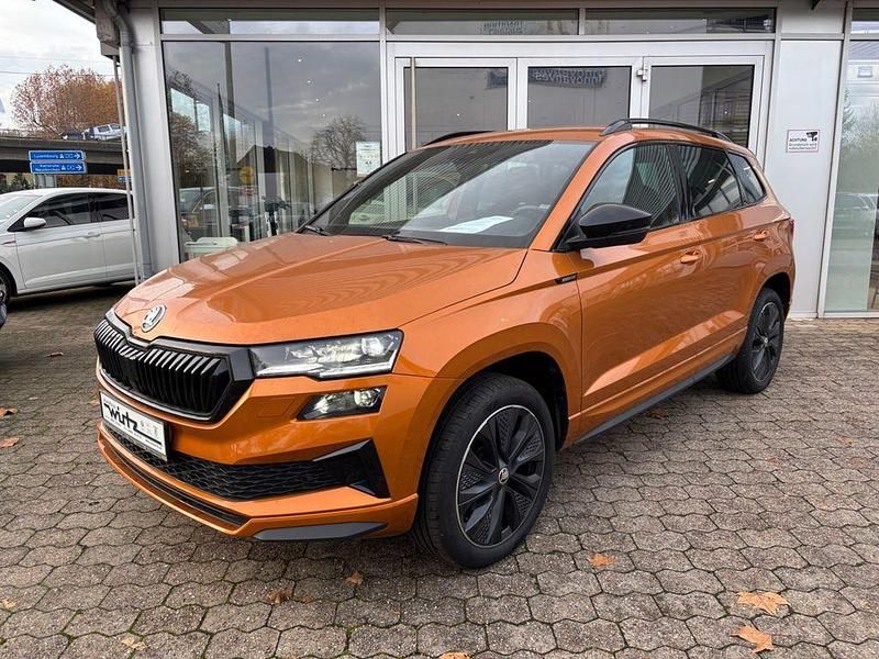 Orange Gebraucht 2024 Skoda Karoq SportLine SUV | 29.990 € (Fairer Preis) - Bild 1/4