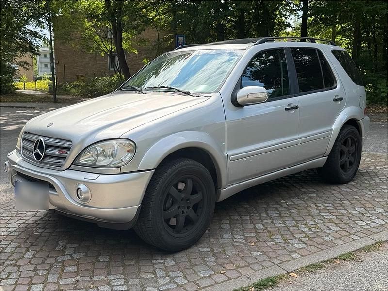 Grau Gebraucht 2003 Mercedes ML55 AMG AMG SUV | 6.900 € - Bild 1/4