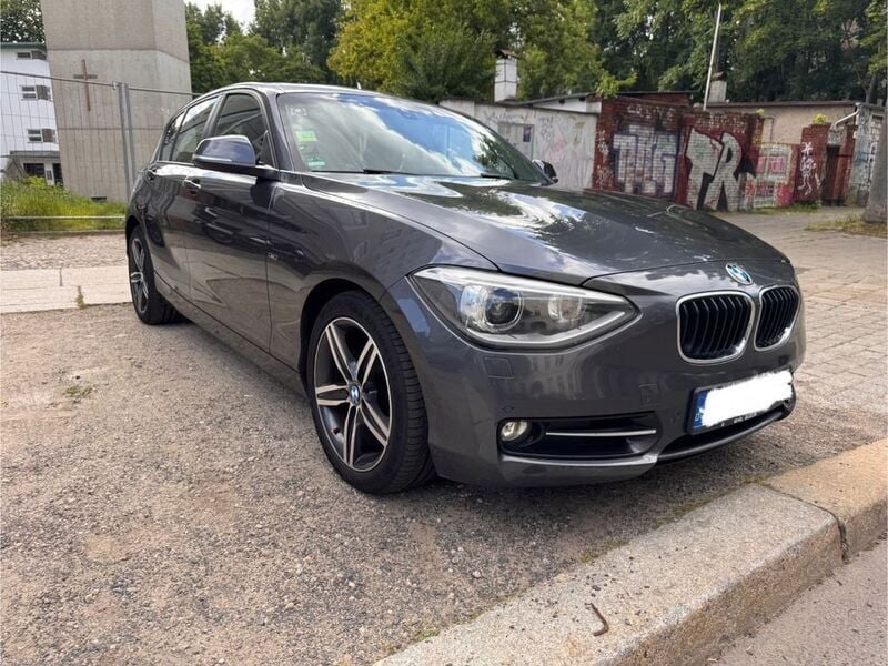 Grau Gebraucht 2012 BMW 120 Sport Line Kleinwagen | 7.250 € (Guter Preis) - Bild 1/4