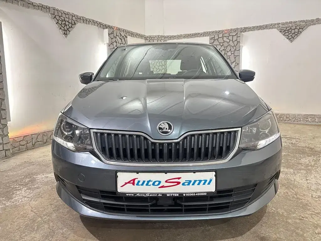 Używany Skoda Fabia 90 KM (66 kW) 2015 Szary Sedan/Limuzyna