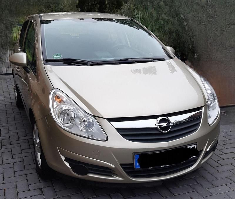Second-hand Opel Corsa 60 CP (44 kW) 2009 Auriu Hatchback