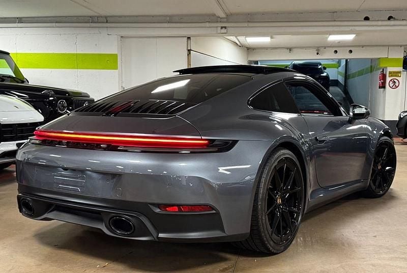 Vanadiumgrau Gebraucht 2024 Porsche 911 Carrera Coupé | 146.000 € - Bild 1/4