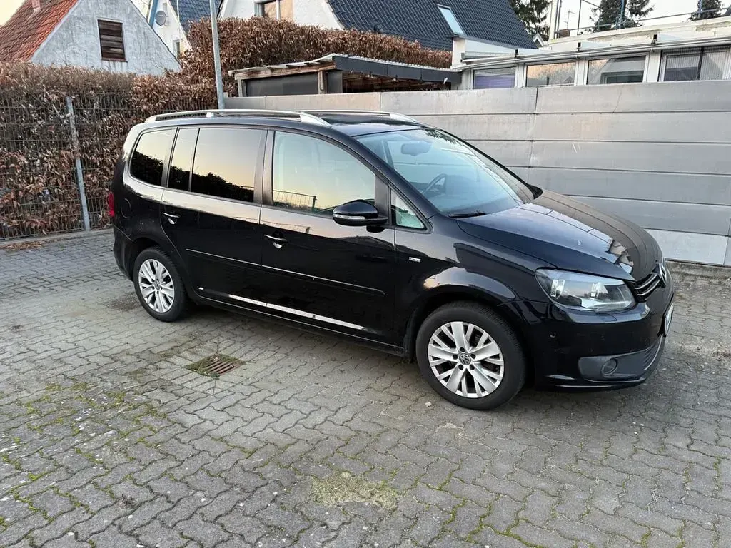 Gebraucht VW Touran Life 105 PS (77 kW) 2013 Schwarz Van / Kleinbus