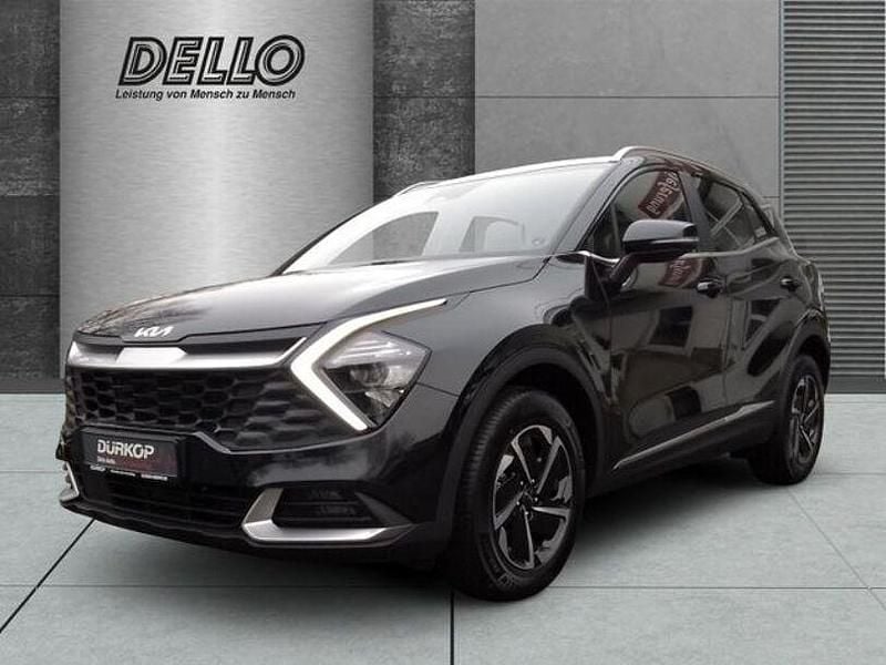 (1k) pearl black m Gebraucht 2024 Kia Sportage Comfort SUV | 34.950 € (Guter Preis) - Bild 1/4