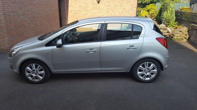 Używany Opel Corsa 118 KM (86 kW) 2010 Srebrny Hatchback