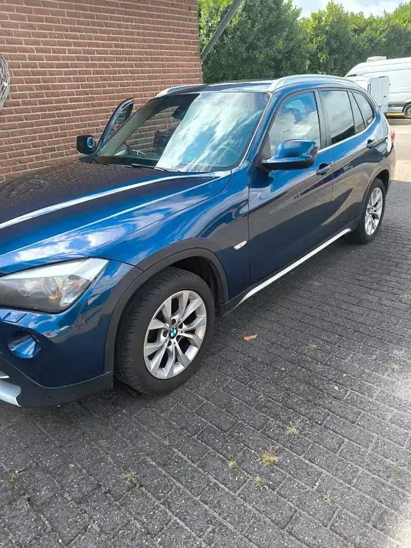 Second-hand BMW X1 204 CP (150 kW) 2011 Albastru SUV