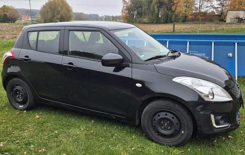 Gebraucht Suzuki Swift 90 PS (66 kW) 2015 Schwarz Kleinwagen