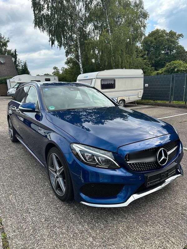 Blau Gebraucht 2014 Mercedes C220 AMG line Kombi | 15.500 € (Fairer Preis) - Bild 1/4