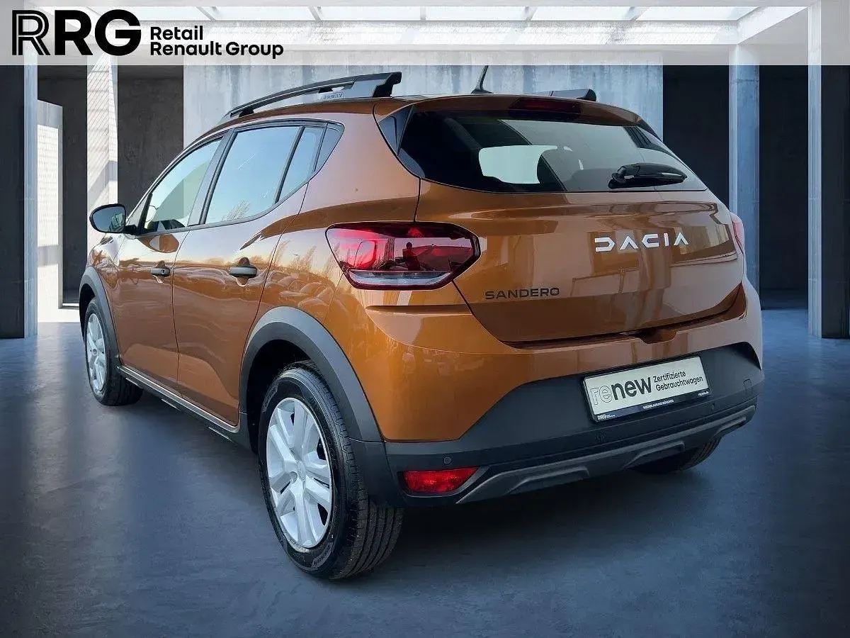 Gebraucht Dacia Sandero Essentiel 101 PS (74 kW) 2024 Atacamaorange (orange) Limousine