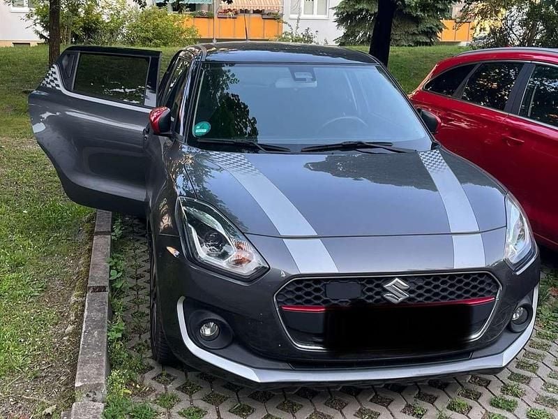 Grau Gebraucht 2017 Suzuki Swift Comfort+ Limousine | 10.500 € (Superpreis) - Bild 1/4