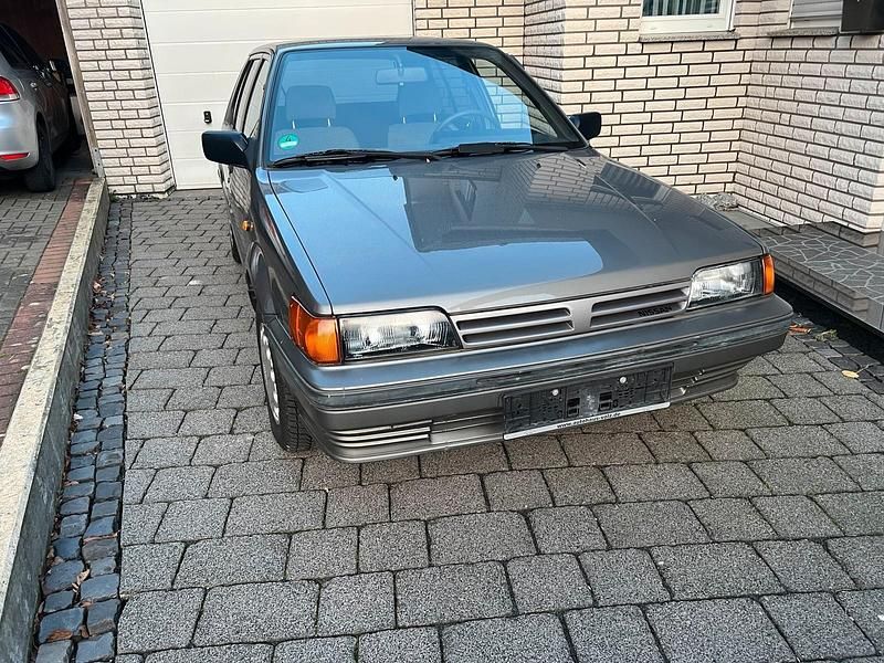 Grau Gebraucht 1987 Nissan Sunny Kleinwagen | 4.000 € - Bild 1/4