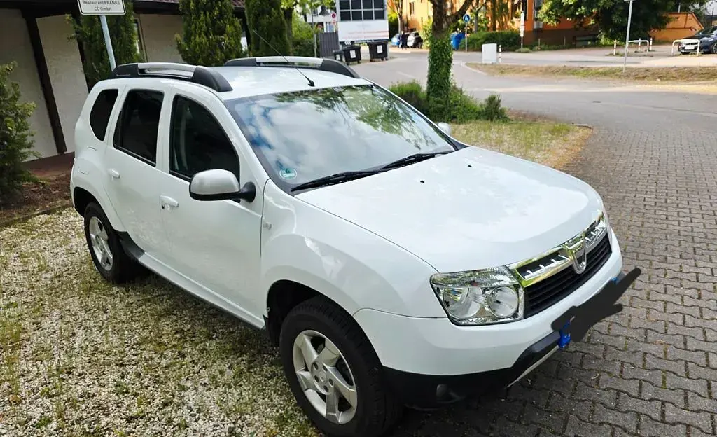 Używany Dacia Duster Prestige 105 KM (77 kW) 2012 Biały SUV