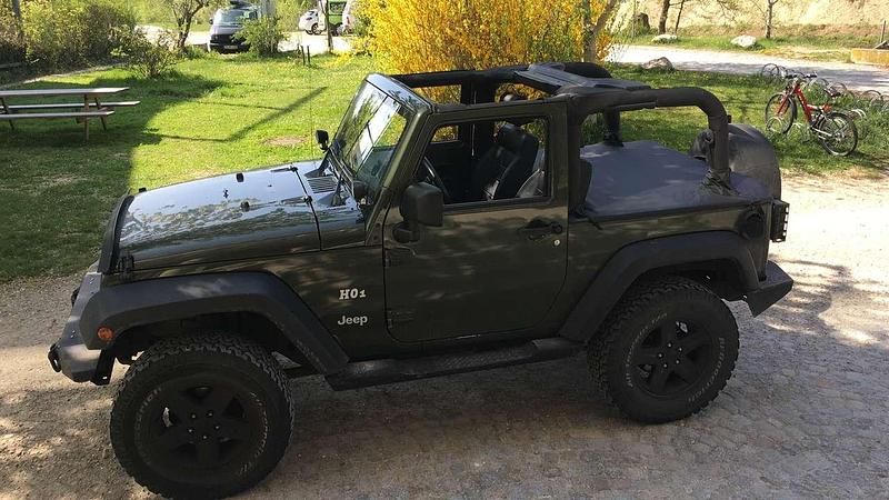 Grün Gebraucht 2007 Jeep Wrangler Sport SUV | 13.999 € (Fairer Preis) - Bild 1/4