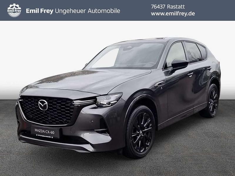 Machine grey metallic Neu 2025 Mazda CX-60 Homura-Line SUV | 66.450 € - Bild 1/3