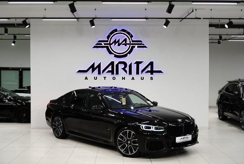 Black sapphire metallic Gebraucht 2021 BMW 730 M Sport Limousine | 59.299 € - Bild 1/4