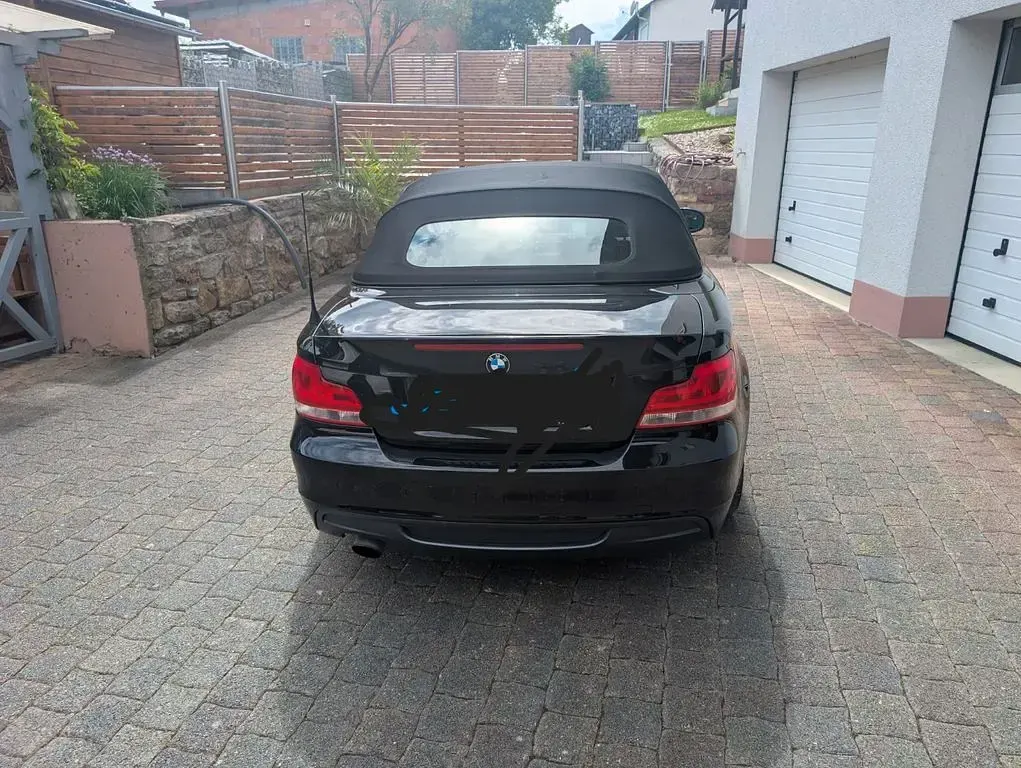 Gebraucht BMW 120 Cabriolet Sport Line 170 PS (125 kW) 2012 Schwarz Cabrio