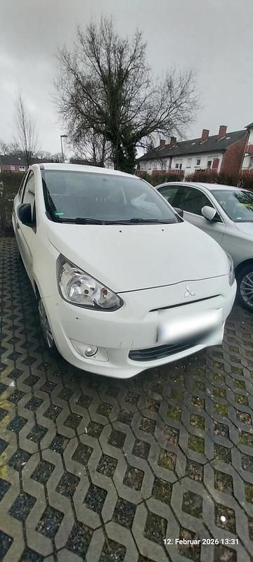 Gebraucht Mitsubishi Space Star 70 PS (51 kW) 2015 Weiß Limousine