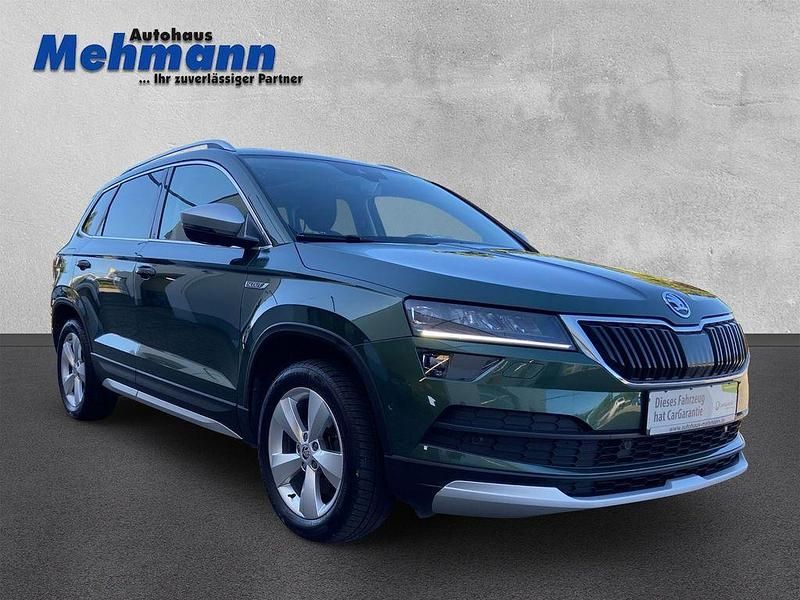 Grün Gebraucht 2019 Skoda Karoq SUV | 24.950 € (Fairer Preis) - Bild 1/4