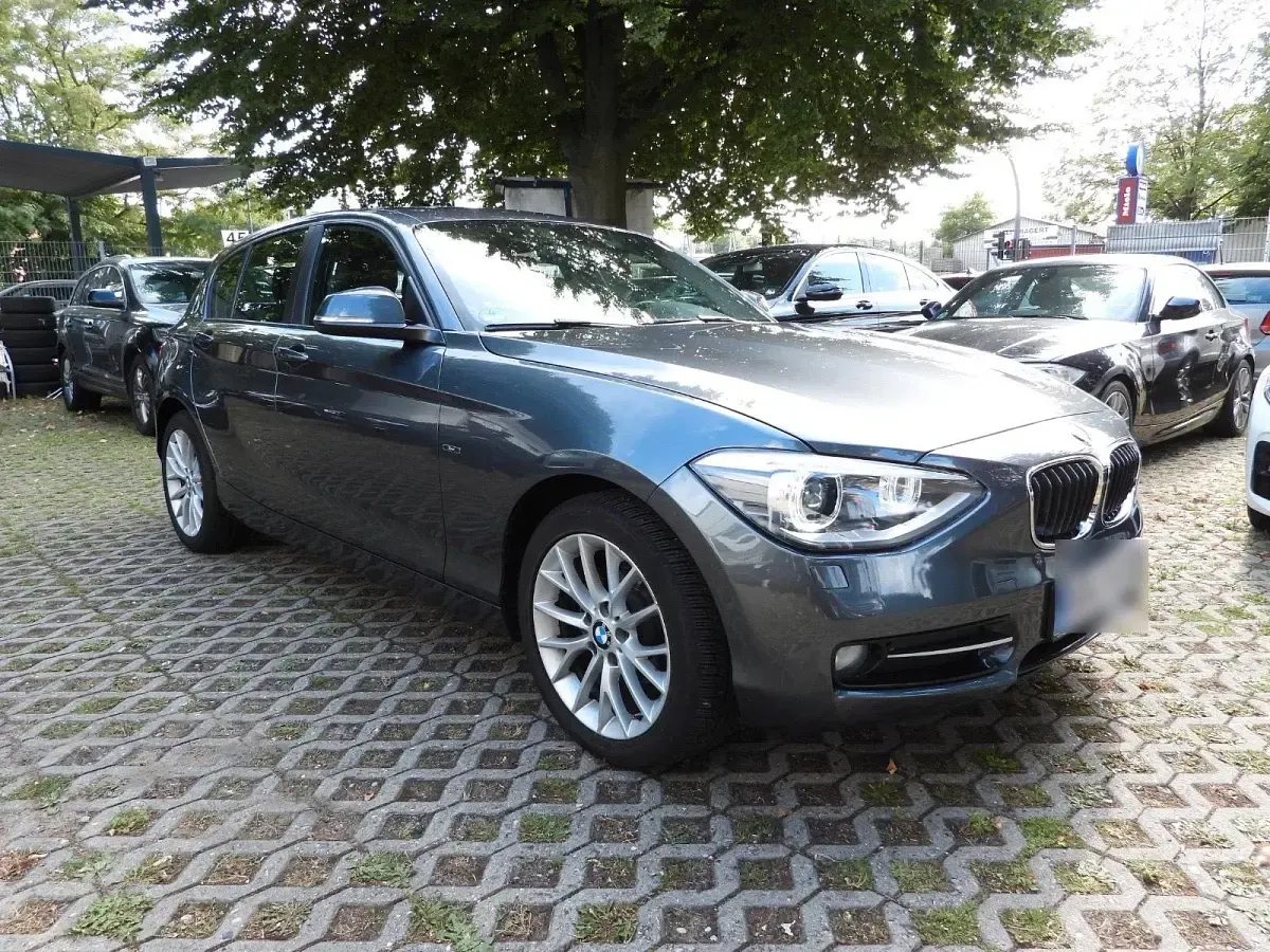 Gebraucht BMW 116 Sport Line 136 PS (100 kW) 2014 Grau Kleinwagen